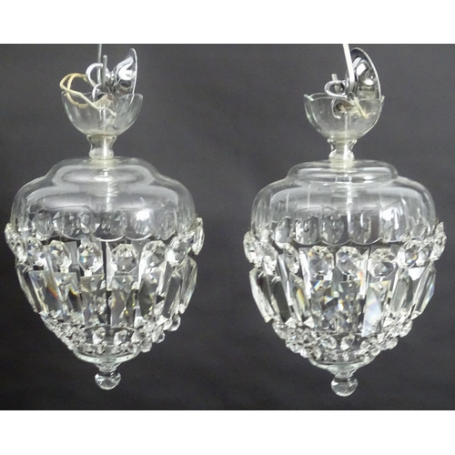 442 - A pair of crystal facet cut glass electric and chrome pendant light fittings, 7 1/2'' wide x 12'' hi... 