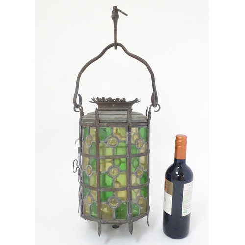 444A - A late 19thC continental stained and leaded glass (with bullseyes) cylindrical pendant lamp, with a ... 