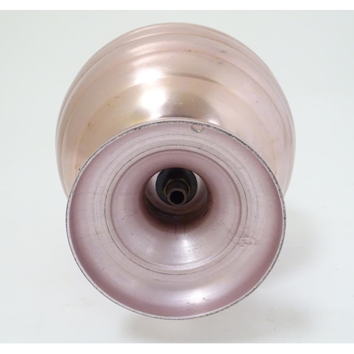 448 - A 1960s lamp of anodised aluminium with a pink/bright copper colour finish, 12 1/2'' high.