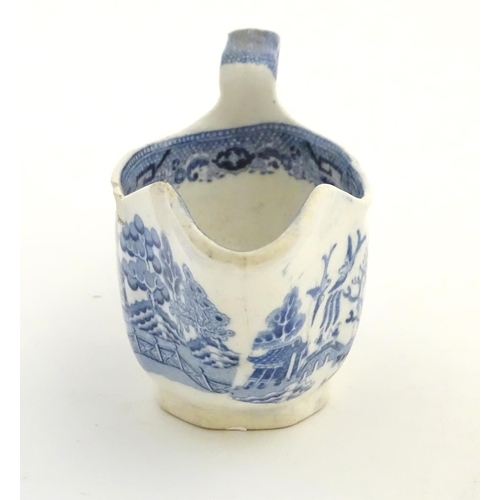 45 - A quantity of blue and white items, to include a twin handled bowl decorated with Classical urns and... 