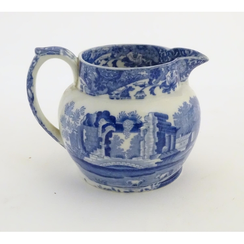 45 - A quantity of blue and white items, to include a twin handled bowl decorated with Classical urns and... 