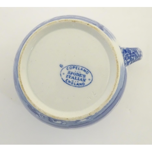 45 - A quantity of blue and white items, to include a twin handled bowl decorated with Classical urns and... 