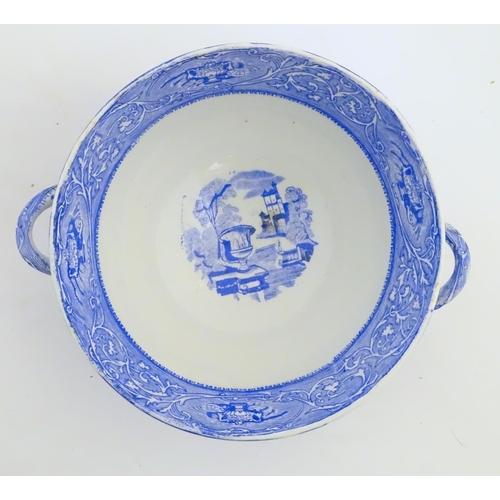 45 - A quantity of blue and white items, to include a twin handled bowl decorated with Classical urns and... 