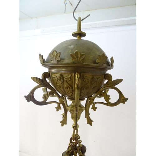 453 - Chandelier: a large Neo-Gothic circular, hanging, 2 stage brass pendant chandelier having 6 ornate s... 