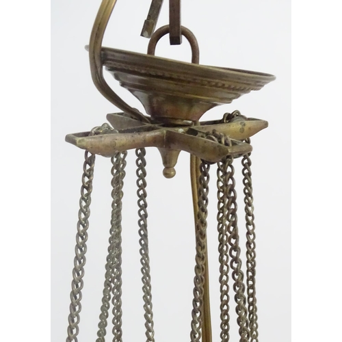 458A - Hall lantern: a brass Rise and Fall glazed lamp now converted to electricity, with raised Greek key ... 