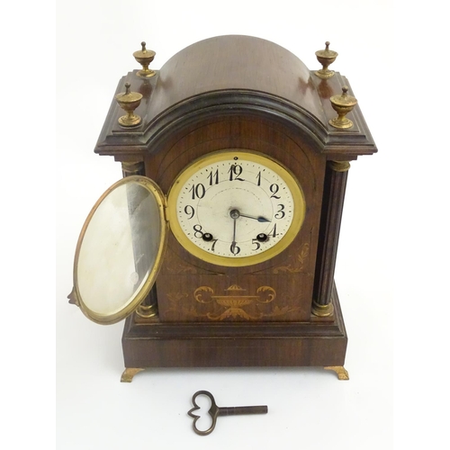 462 - An inlaid rosewood bracket clock: A late 19thC Lenzkirch ting tang clock (stamped and numbered '6066... 