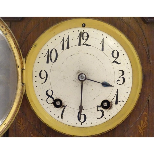 462 - An inlaid rosewood bracket clock: A late 19thC Lenzkirch ting tang clock (stamped and numbered '6066... 