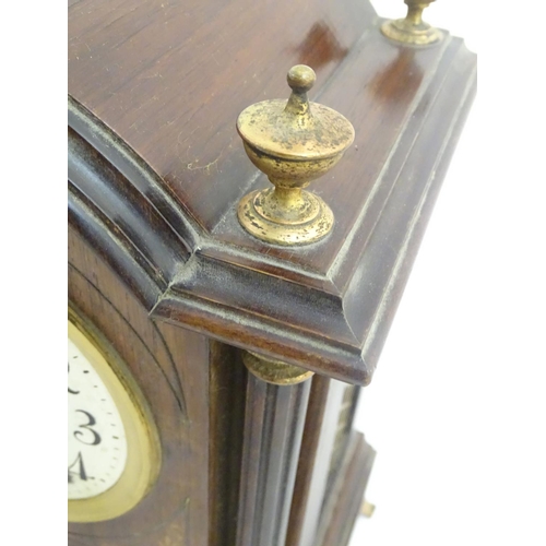 462 - An inlaid rosewood bracket clock: A late 19thC Lenzkirch ting tang clock (stamped and numbered '6066... 