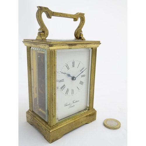 467 - Charles Frodsham, London: a brass cased carriage clock (timepiece) with a signed enamel dial and 5 b... 