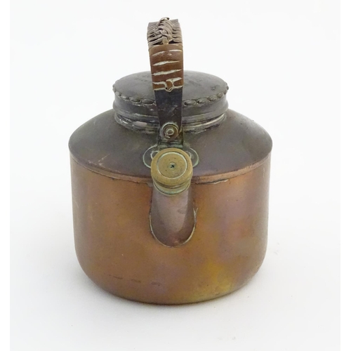 480 - Picnic Kettle: A small copper kettle with brass fitments and wicker wrapped handle. Marked '... Drew... 