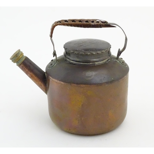 480 - Picnic Kettle: A small copper kettle with brass fitments and wicker wrapped handle. Marked '... Drew... 