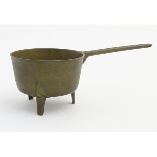 489 - Skillet: a mid 18thC Welsh phosphor-bronze three stile footed cooking pan with the name 'P. Llewelli... 