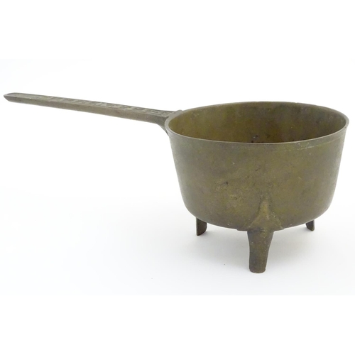 489 - Skillet: a mid 18thC Welsh phosphor-bronze three stile footed cooking pan with the name 'P. Llewelli... 