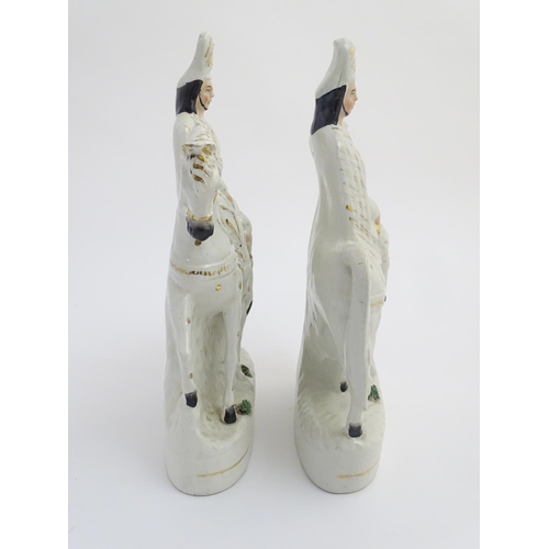 51 - A pair of Victorian Staffordshire pottery flatback figures modelled as Bonnie Prince Charlie on hors... 