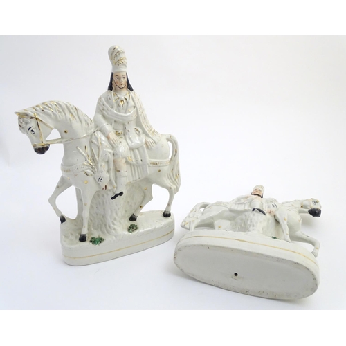 51 - A pair of Victorian Staffordshire pottery flatback figures modelled as Bonnie Prince Charlie on hors... 