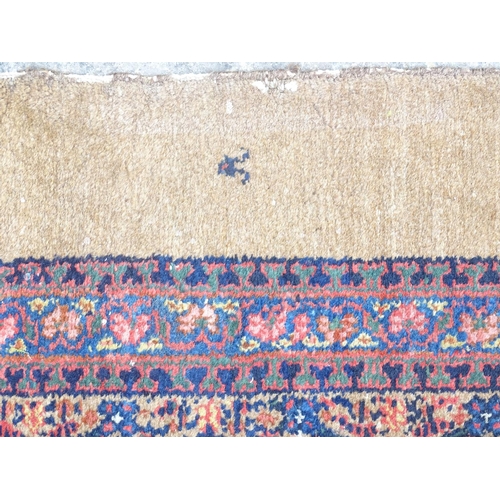 520 - Carpet / Rug : a hand woven Signed Runner with a red central ground, blue, navy blue, pink, black an... 