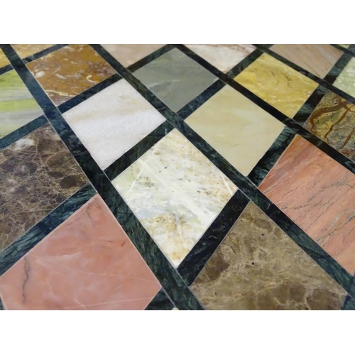 521 - Garden and Architectural Salvage : A specimen marble table top with inlaid diamond shaped marble sec... 