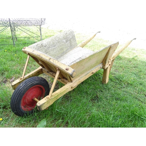 535 - Garden & Architectural , Salvage: An early to mid 20thC flower sellers wooden wheelbarrow with singl... 