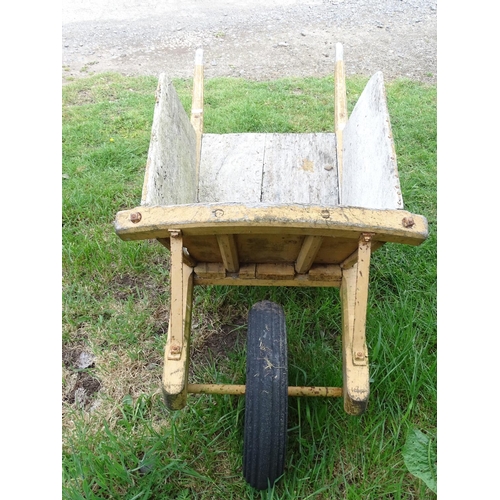 535 - Garden & Architectural , Salvage: An early to mid 20thC flower sellers wooden wheelbarrow with singl... 