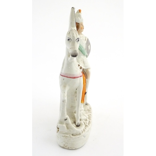 54 - A Staffordshire pottery flat back figure of a knight on horseback. Approx. 11'' high.