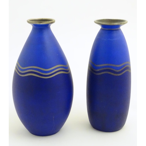 58 - Two blue studio pottery two-tone vases decorated with three gilt undulating bands, gilt rims and a b... 