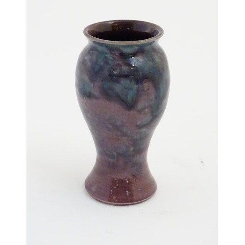 60 - A Baron Barnstaple pottery vase, with a high fired glaze. Marked under. Approx 5 1/4'' high.