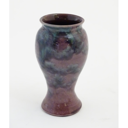 60 - A Baron Barnstaple pottery vase, with a high fired glaze. Marked under. Approx 5 1/4'' high.