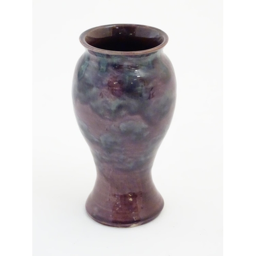 60 - A Baron Barnstaple pottery vase, with a high fired glaze. Marked under. Approx 5 1/4'' high.