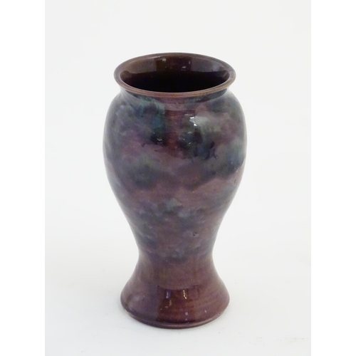 60 - A Baron Barnstaple pottery vase, with a high fired glaze. Marked under. Approx 5 1/4'' high.