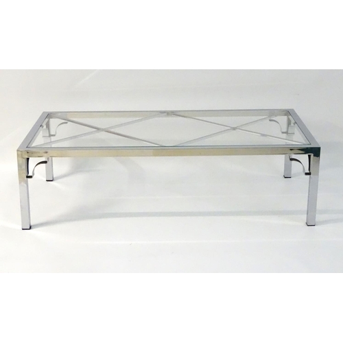 733 - Vintage Retro mid Century modern: A large chromed and glass topped coffee table with cross bracing, ... 