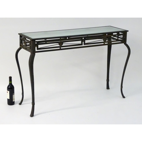 734 - Vintage Retro: a powder coated hall table with plate glass top, ornate cabriole legs and frieze deco... 