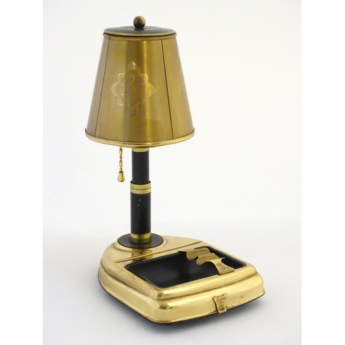 739 - Vintage Retro :   A ' Golden Age ' musical clockwork cigarette dispenser and ashtray formed as a tab... 
