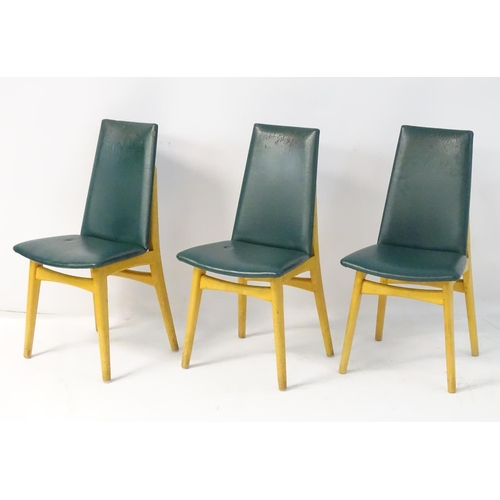 744 - Vintage Retro : A set of 3 British 1960's Ercol ? kitchen chairs with blonde wood frames.