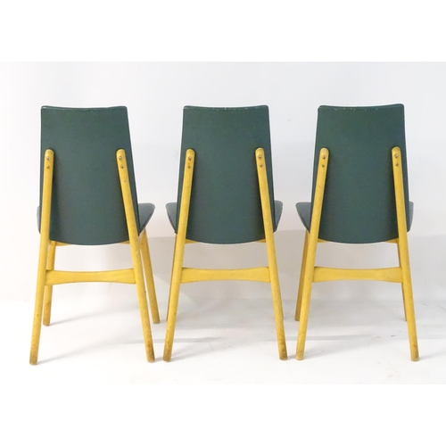 744 - Vintage Retro : A set of 3 British 1960's Ercol ? kitchen chairs with blonde wood frames.