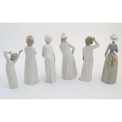 77 - Four Nao figures to include 'Boy with Slippers', model no. 232, 'Boy with Books', model no. 233, 'Gi... 