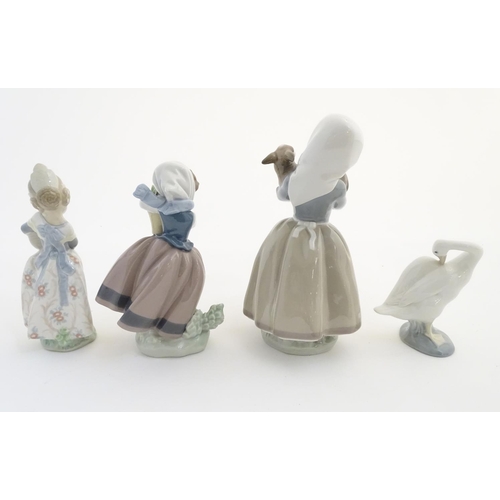 78 - Three Lladro figures, comprising 'Spring is Here' no. 5223, a girl holding a flower pot, 'Valencia G... 