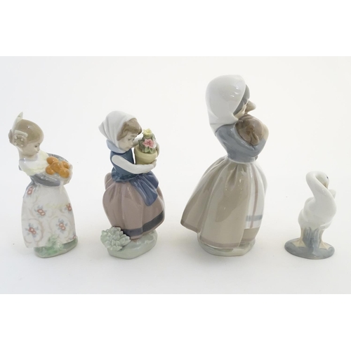 78 - Three Lladro figures, comprising 'Spring is Here' no. 5223, a girl holding a flower pot, 'Valencia G... 