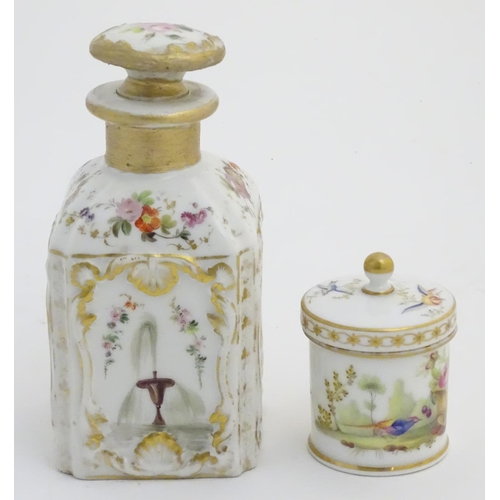 80 - Two Continental lidded ceramic containers; a small pot decorated with hand painted birds, fruit and ... 