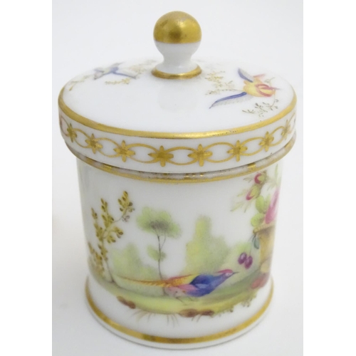 80 - Two Continental lidded ceramic containers; a small pot decorated with hand painted birds, fruit and ... 