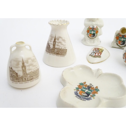 83 - A quantity of local interest crested ware of various forms, including a miniature Toby jug, cups, ju... 