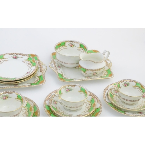 85 - A quantity of Fenton tea wares in the pattern Kenmare, to include cups and saucers, side plates, san... 