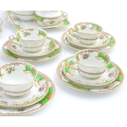 85 - A quantity of Fenton tea wares in the pattern Kenmare, to include cups and saucers, side plates, san... 