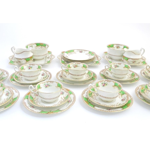 85 - A quantity of Fenton tea wares in the pattern Kenmare, to include cups and saucers, side plates, san... 