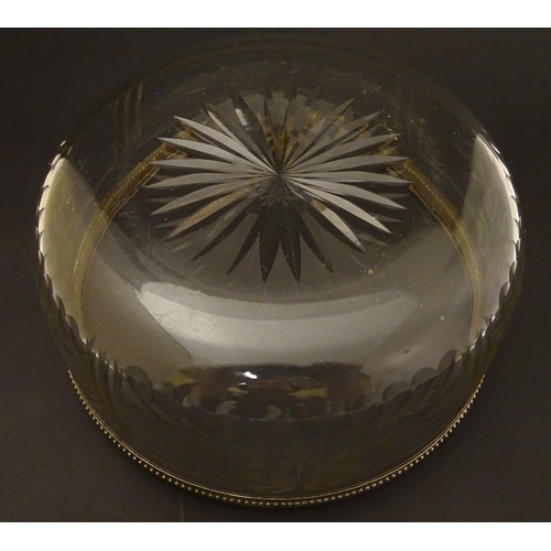 90 - A circa 1900 silver plate rimmed glass bowl , with star cut base and wheel cut ribbon and foliate de... 