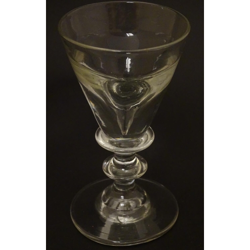 91 - Glass: a late Georgian Toastmasters / Illusion wine glass of pedestal form, standing 4'' high