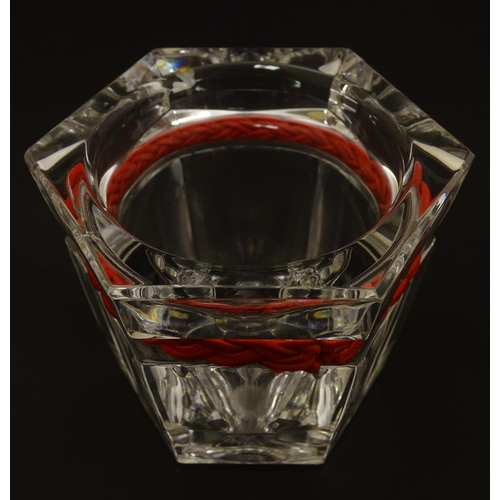 93 - Ralph Lauren : a hexagonal clear glass small bowl with plaited red strung band , 2 3/4'' high x 3'' ... 