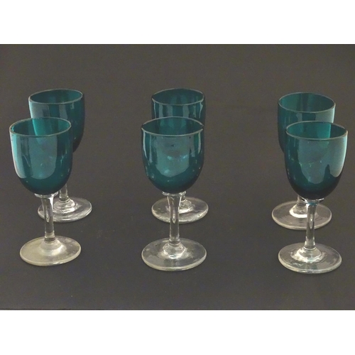 97 - Glass : a set of 6 green / Turquoise pedestal wine glasses with clear glass stems and feet, 4 7/8'' ... 