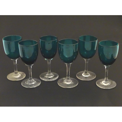 97 - Glass : a set of 6 green / Turquoise pedestal wine glasses with clear glass stems and feet, 4 7/8'' ... 