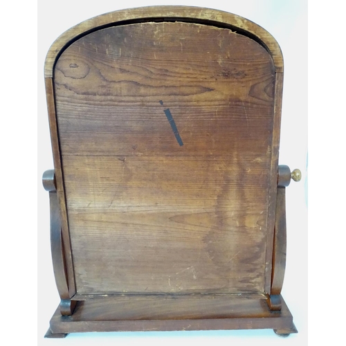 125 - A Victorian mahogany toilet mirror