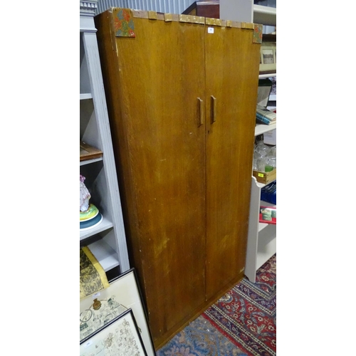 129 - E. Gomme, light oak wardrobe (2 door)